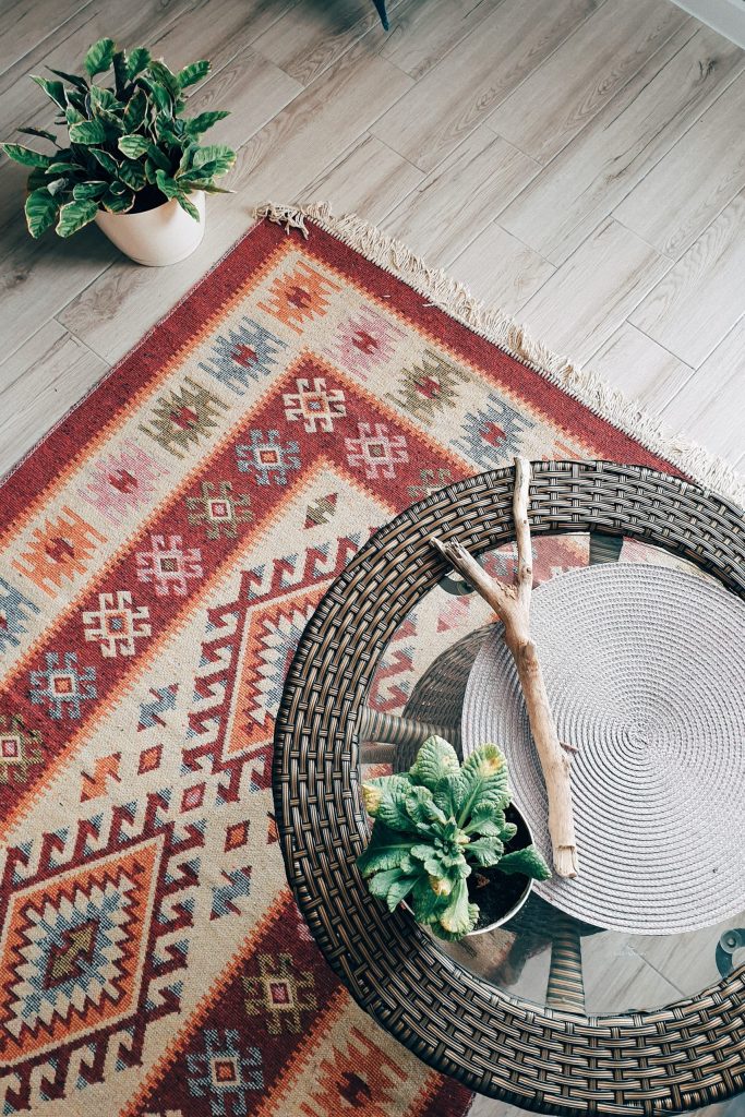 (alt-text: Let your feet get cosy by adding a rug to your living space.) 
