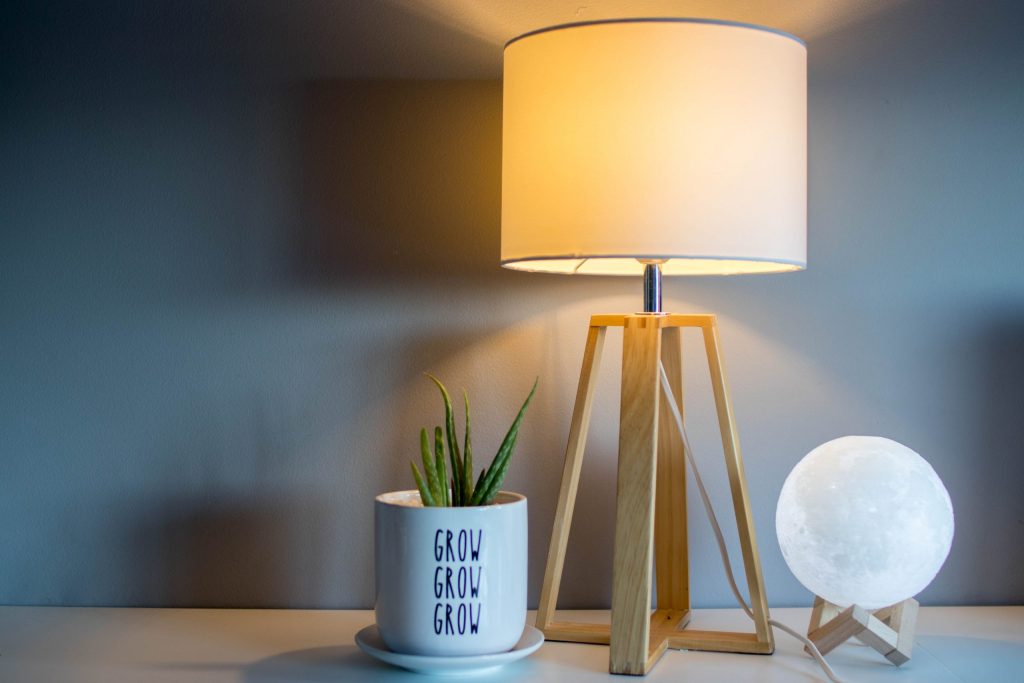 (alt-text: Adding more light with table lamps is an easy way to make a house feel more like home.) 