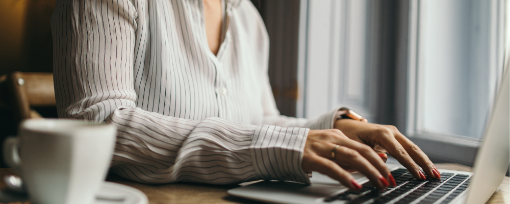 lady typing on laptop
