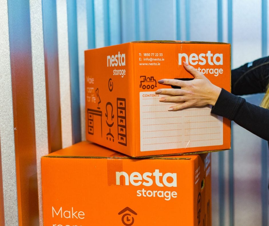 Secret santa office 1 - Nesta nesta self storage boxes stacked on top of each other