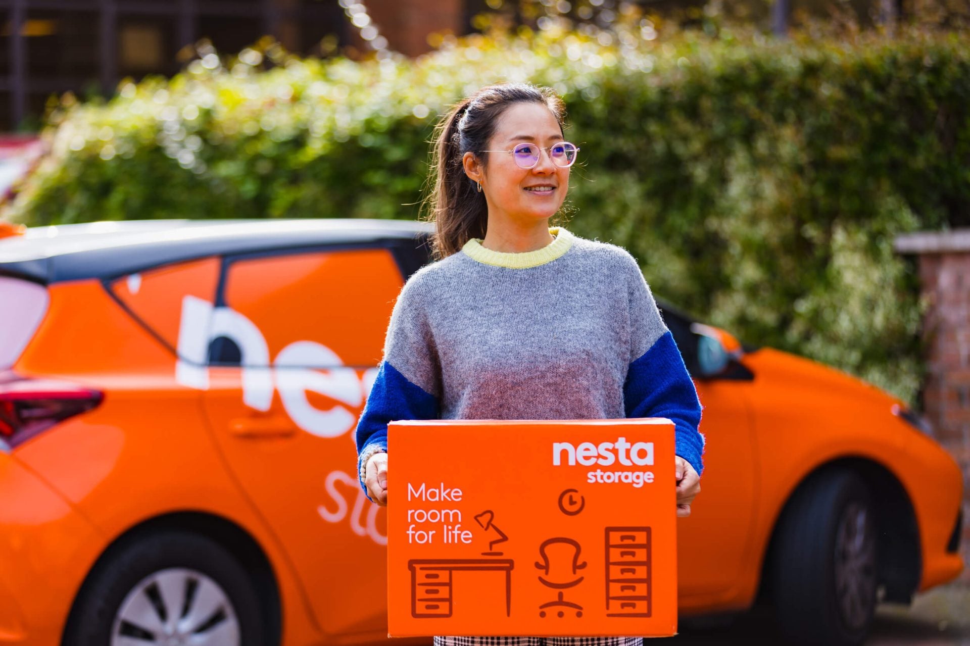 Student-Storage - Nesta Student holding a Nesta storage box